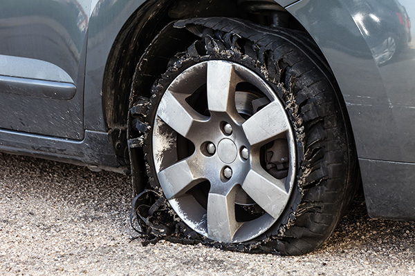 Can You Drive with a Flat Tire? | Four Car Garage